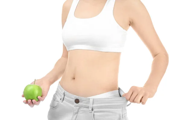 Femme en jean oversize et avec pomme — Photo