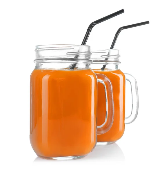 Mason jars of delicious carrot juice — Stock Photo, Image