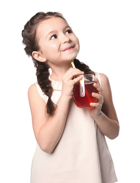 Söt liten flicka med glas juice — Stockfoto