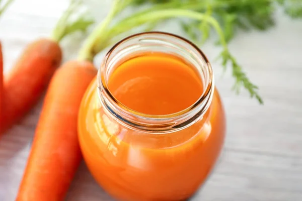 Jar of carrot juice — Stock Photo, Image