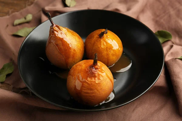 Baked pears in plate — Stock Photo, Image