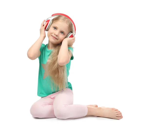 Menina bonito com fones de ouvido — Fotografia de Stock