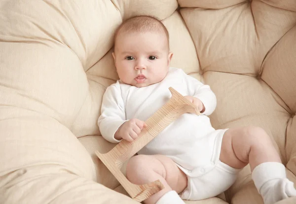 Cute baby with letter — Stock Photo, Image