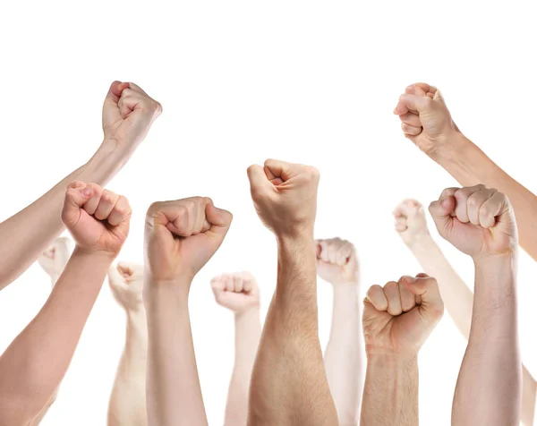 Raised human hands with clenched fists — Stock Photo, Image