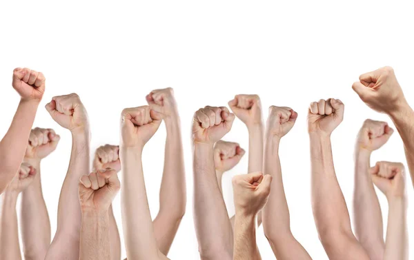 Raised human hands with clenched fists — Stock Photo, Image