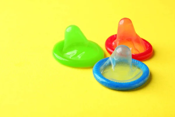 Different colorful condoms — Stock Photo, Image