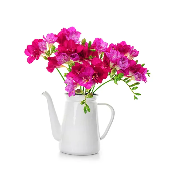 Bouquet of freesia in watering can — Stock Photo, Image