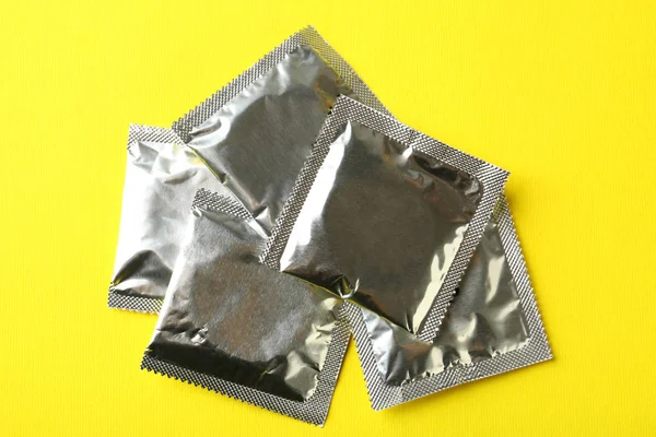 Pile of wrapped condoms — Stock Photo, Image