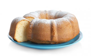 Dilimlenmiş yoğurt kek ile mavi tabak