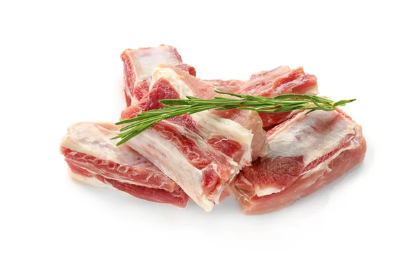 Raw ribs with rosemary isolated on white — Stock Photo, Image