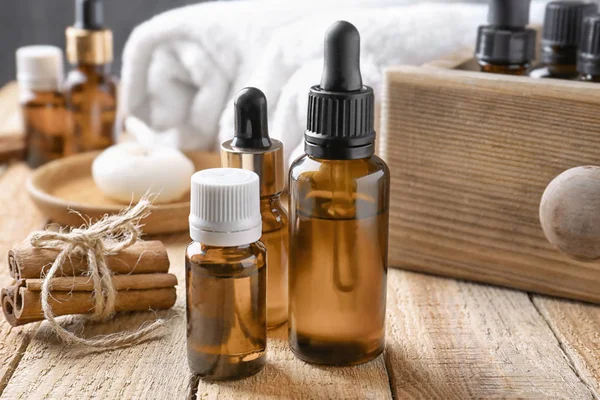 Composition with bottles of cinnamon oil — Stock Photo, Image