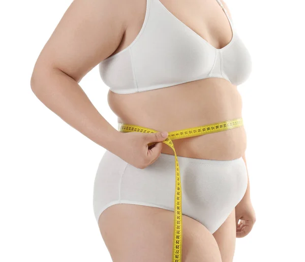 Übergewichtige Frau misst Taille — Stockfoto