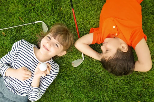 Children with ball and drivers — Stock Photo, Image