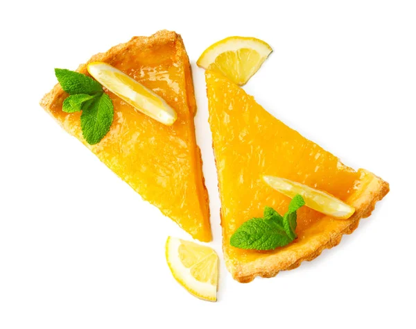 Twee sneetjes fruit wrongel versierd met citroen en mint op witte achtergrond — Stockfoto
