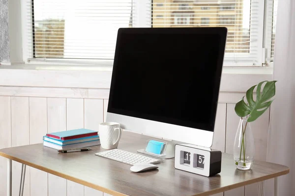 Workplace with modern monitor — Stock Photo, Image