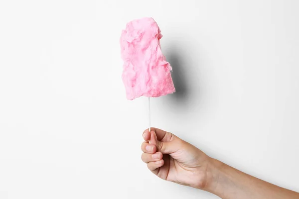 Hand holding sweet cotton candy — Stock Photo, Image