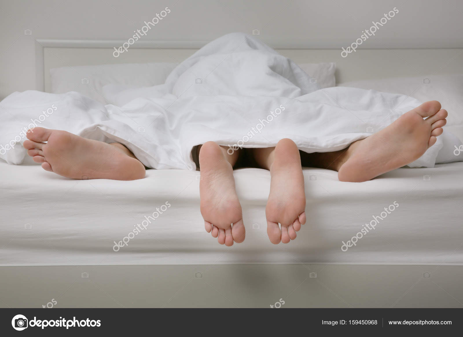 Feet of couple having sex Stock Photo by ©belchonock 159450968 pic