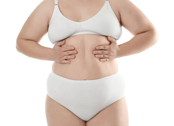 Overweight young woman in underwear — Stock Photo, Image