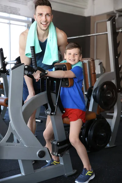 Dad son training gym