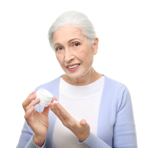 Anciana con tarro de crema —  Fotos de Stock