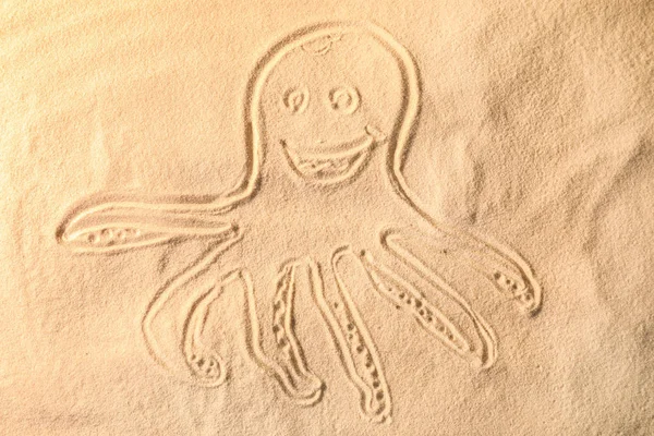 Octopus drawn on sand — Stock Photo, Image