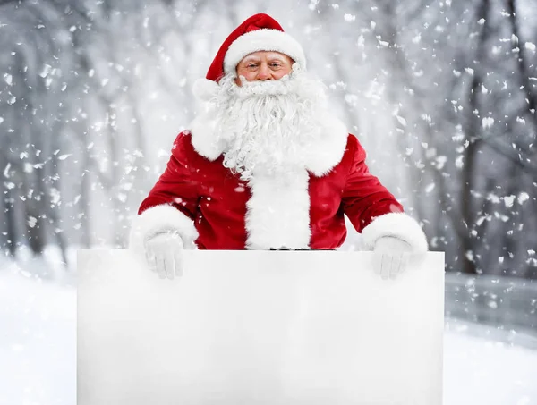 圣诞老人与空白海报 — 图库照片