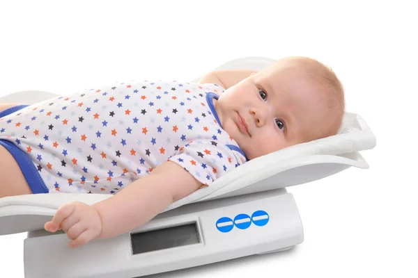 Scales with baby on white background — Stock Photo, Image
