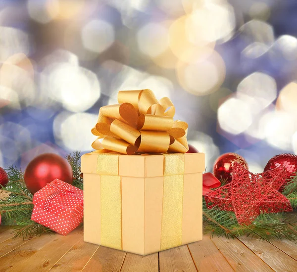 Christmas gift with decorations — Stockfoto