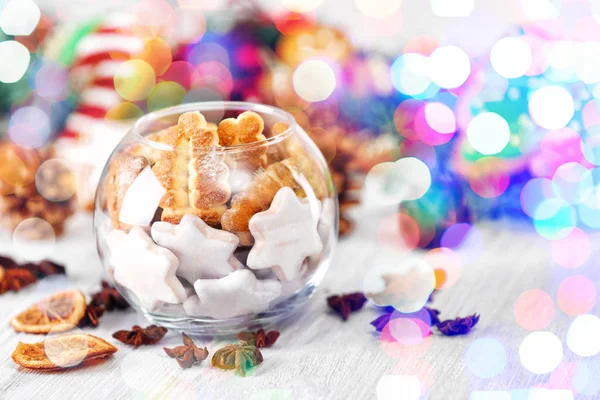 Glass vase with tasty gingerbread cookies — Stock Photo, Image