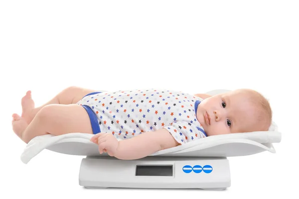Scales with baby on white background — Stock Photo, Image