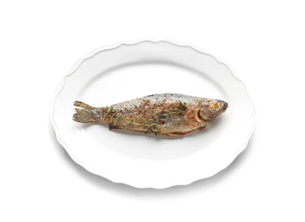 Teller mit leckerem gebratenem Fisch — Stockfoto