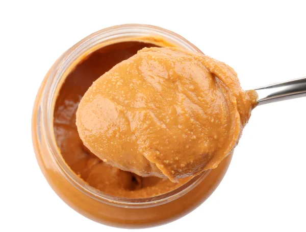 Creamy peanut butter in spoon — Stock Photo, Image