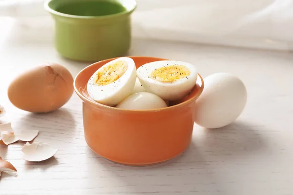 Bowl with sliced hard boiled eggs — Stock Photo, Image