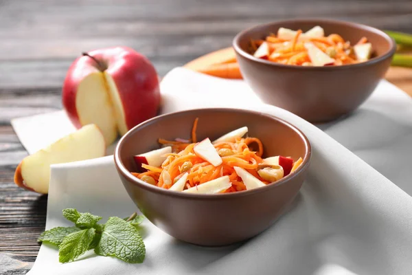 Clay bowls with carrot raisin salad — Stock Photo, Image