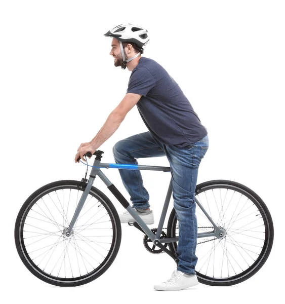 Schöner junger Mann mit Fahrrad auf weißem Hintergrund — Stockfoto