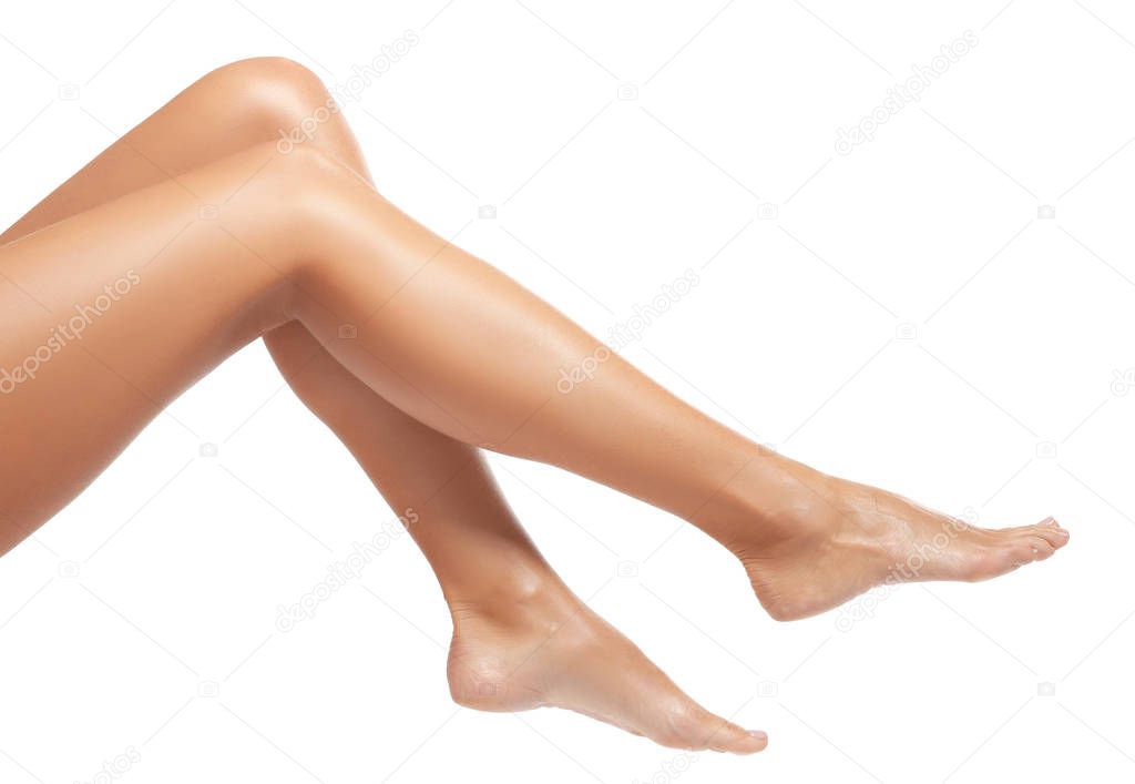 Female legs on white background 