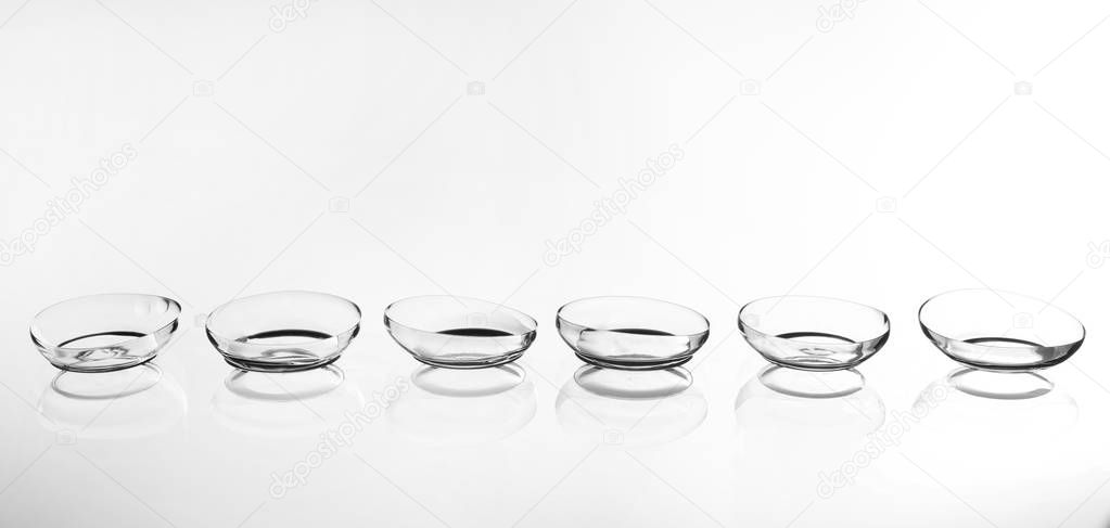 Contact lenses on background