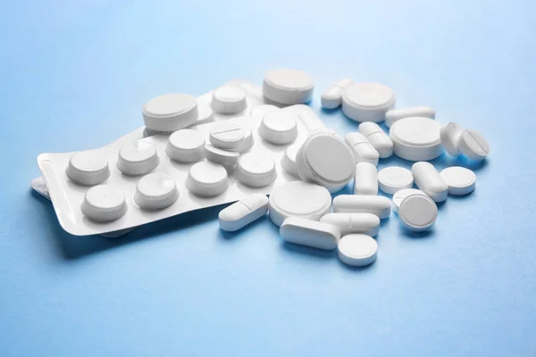 White pills on  background — Stock Photo, Image