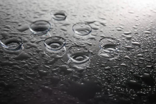 Lenti a contatto e gocce d'acqua — Foto Stock