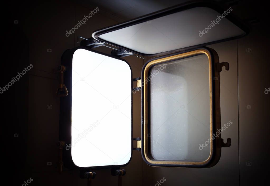 Open porthole of vessel
