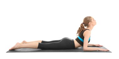 Yoga poz beyaz arka plan üzerinde pratik genç güzel kadın