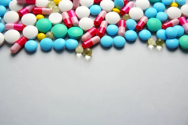 Different pills on light background — Stock Photo, Image