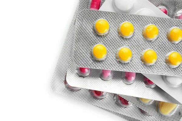 Gesundheitskonzept. Blisterpackungen mit Pillen auf hellem Hintergrund — Stockfoto
