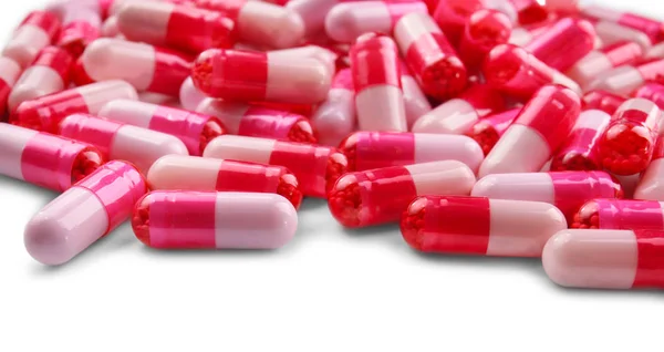 Concept de soins de santé. Pilules colorées sur fond blanc — Photo