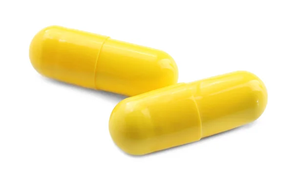 Concetto sanitario. Pillole colorate su sfondo bianco — Foto Stock