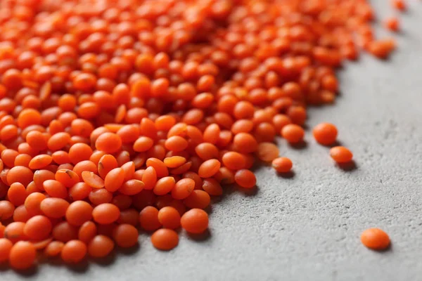 Heap of red lentils on  table — Stock Photo, Image