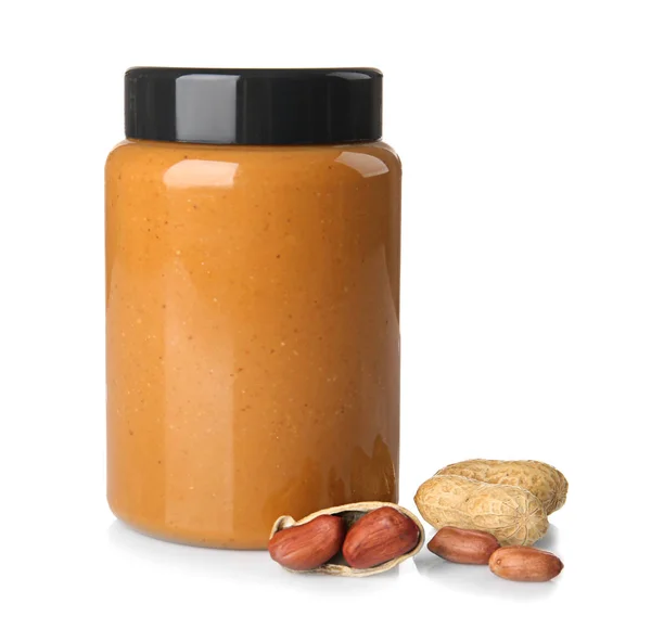 Jar with peanut butter on white background — Stock Photo, Image