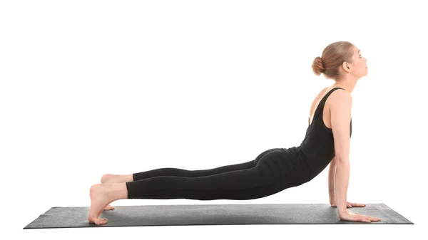 Mooie jongedame het beoefenen van yoga pose op witte achtergrond — Stockfoto