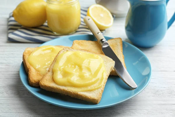 Toasts and lemon curd composition — Stock Photo, Image