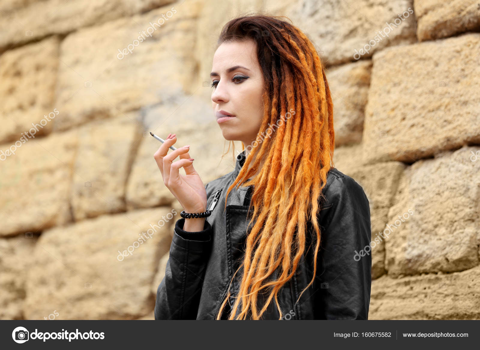 Young Beautiful Woman Smoking Weed Stock Photo